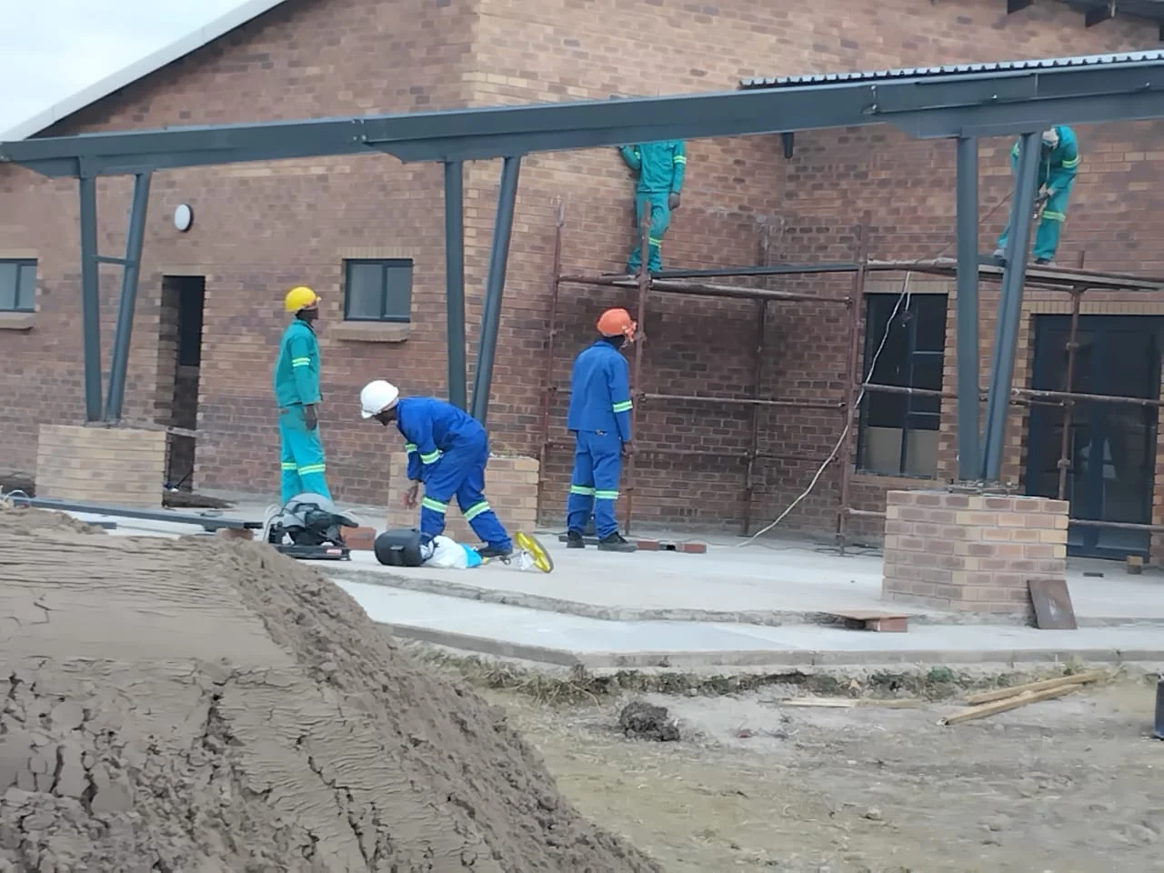 Construction team professionals working on site
